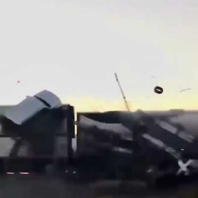 Amtrak train hits semi hauling cars