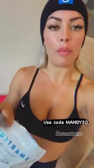 Mandy Rose shilling something