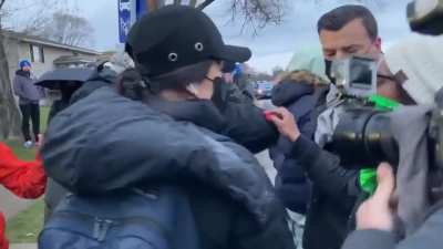 BLM protester assures "It's all peace" as a CNN crew member gets hit in the head, knocked off his feet and laughed at behind her. Very peaceful.