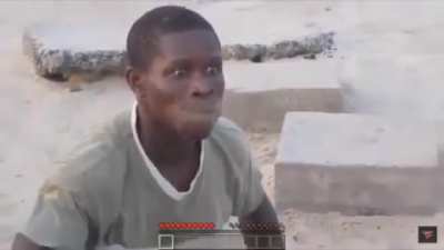 Guy eats a bunch of sand