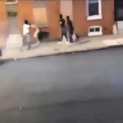 A group of black kids assaulting a white/mexican kid