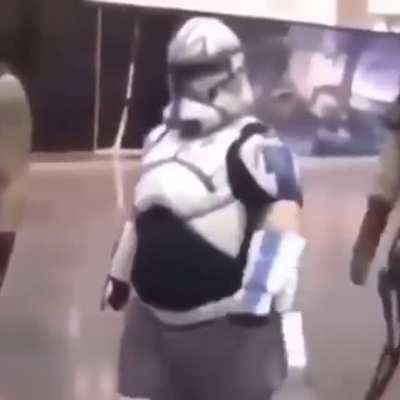 Mandalorians of Clan Re'diit on their annual parade. Note the startled civilians in the background.