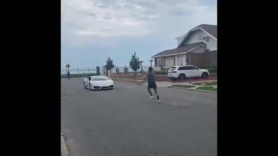 Dude tries to jump over a Lamborghini
