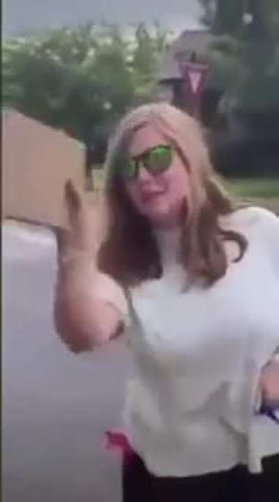 I'd probably let her take it, then sic USPIS on her