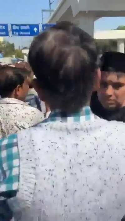 Police officer in India kicks Muslims who are praying in the middle of the road