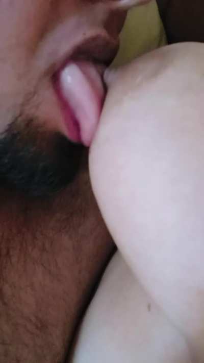 Sucking her beautiful tit!