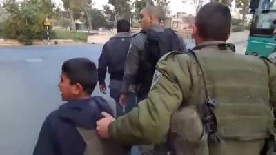 Dozens of fully armed IDF soldiers arresting and terrorizing little kids (for the "crime" of throwing stones and sometimes for no reason at all)