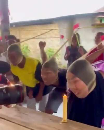Competitive candle blowing at a birthday party?