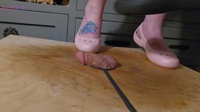 Two doms can't get enough of stomping on cock and balls!