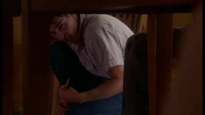 Jennifer Connelly lets Joaquin Phoenix look up her skirt in Inventing the Abbotts (1997)