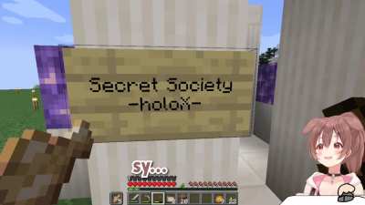 Korone Tries To Read "Secret Society"