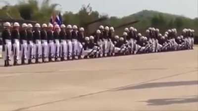 A row of soldiers with very impressive line discipline