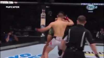 Yair Rodr&iacute;guez lays out The Korean Zombie in the last second of their fight.