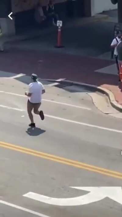Man running away from the ambulance because he's afraid of the bill