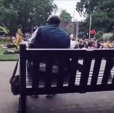 A man singing "Living on a Prayer" alone in a park was joined by the entire park.