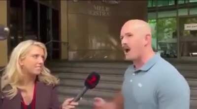 Australian Neo-Nazi loses it at reporter because she won't ask him the questions he wants.
