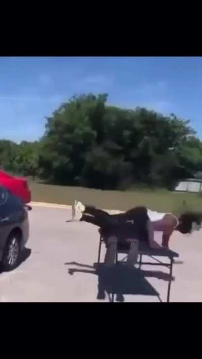 Jumping from a car onto a table with a person laying on it