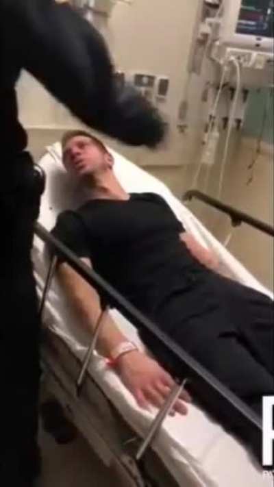 Cop assaults a suicidal man in hospital bed while his donut partner films it