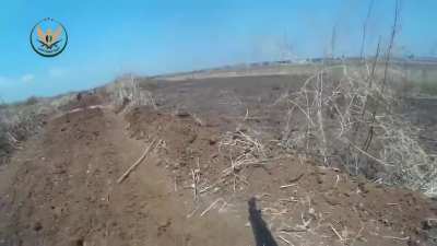 NLF fighter wearing a GoPro confronts a Syrian Army advance with RPGs &amp;amp; a PKM - al-Jabain - 2019