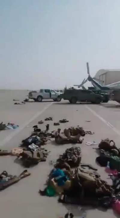 US Backed ANA ditched their military gear while fleeing, footage from an airfield near kandahar