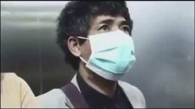 Generous guy gives a face mask for protection.