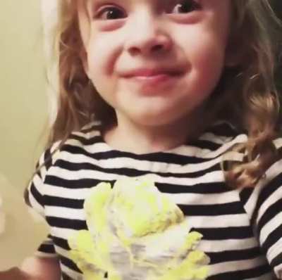 This little girl pretending to like mommy&rsquo;s cooking