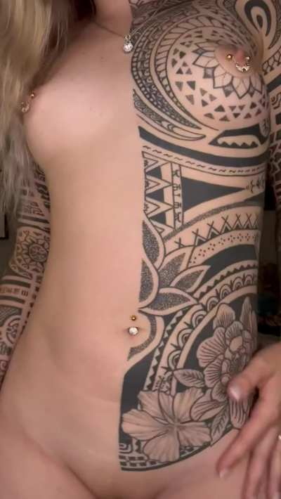 Jumping up and down with tatted tits makes for a mesmerizing combo