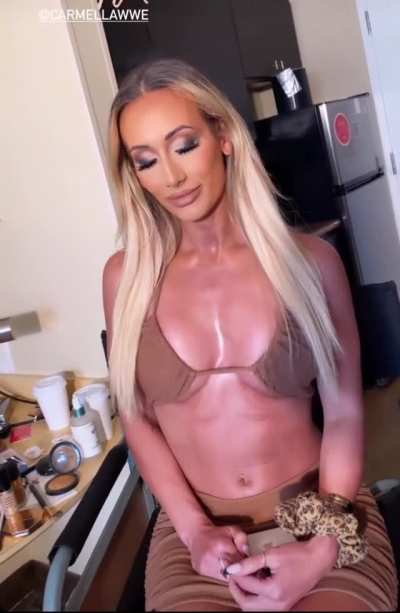 she is just wearing a bra as a top
