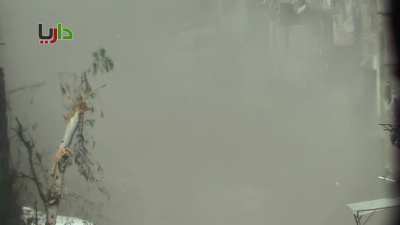 Rebel anti-tank team cracks a shot at a patrolling SAA tank, the tank responds in kind - Daraya - 3/21/2013