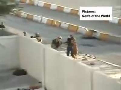 Civilians in Iraq harass and attack the invading UK soldiers, who respond by gathering small boys and beating them while filming and cheering.