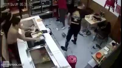 Chinese food fight over a steaming hot table