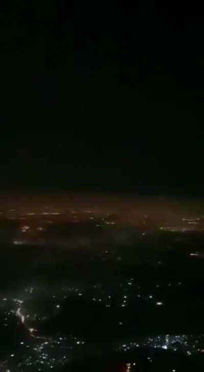 View of Iron Dome interceptions over Tel Aviv from a commercial flight just now (5/12/2021)