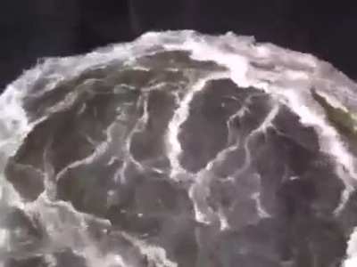 Massive surge tank at a hydroelectric power plant.