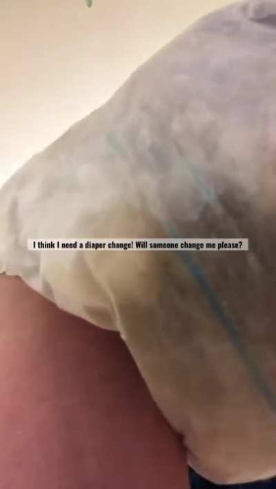 Girl messes her diaper.