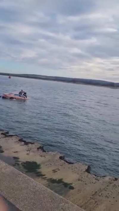 Someone drove their Bentley Flying Spur into the water