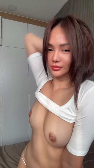 a cute asian brunette with adorable boobs