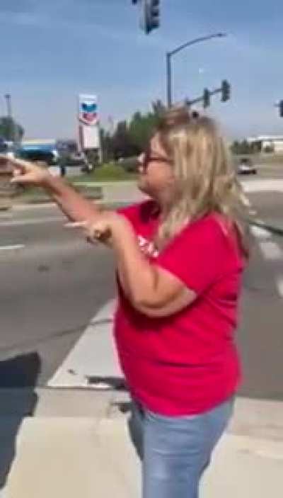 More footage of a woman harassing a man with a BLM flag in Idaho