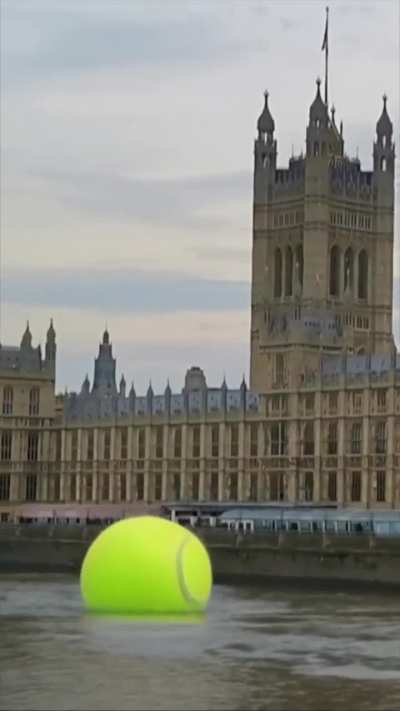 Tennis Balls taking a scenic float down the Thames