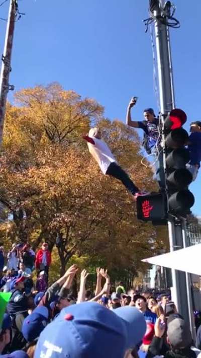 Standing on a traffic light