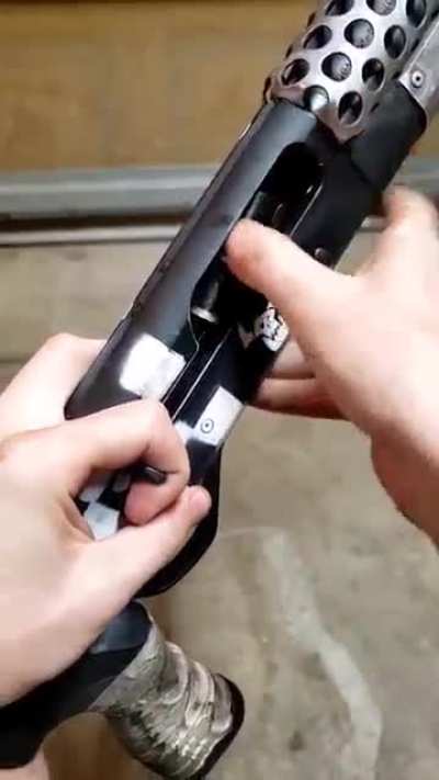 Someone turned their shotgun into Ork Shoota!