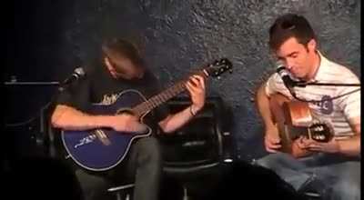 Playing classical music with acoustic guitars. This duo is so amazing!