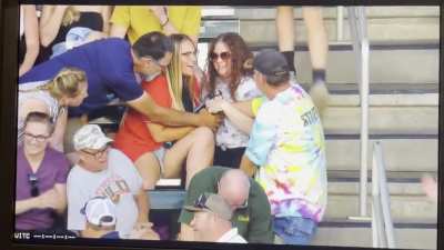 Creepy grown man fights two girls for a baseball in their laps that he didn&rsquo;t try to catch