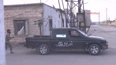 Opposition fighters target Syrian Army positions with what appears to be a cannibalized rocket system - al-Dar al-Kabirah - 5/9/2013