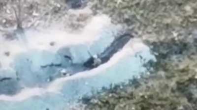 Ukrainian soldier runs into the path of a Russian FPV drone and is flung out of his trench 