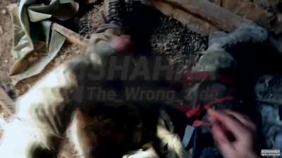 Ukranian Soldier applies first aid on himself while under artillery fire