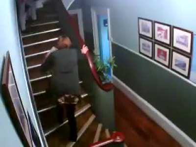 Drunk couple falling down stairs.