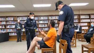 Cops drag man out of school board meeting for refusing to wear a mask