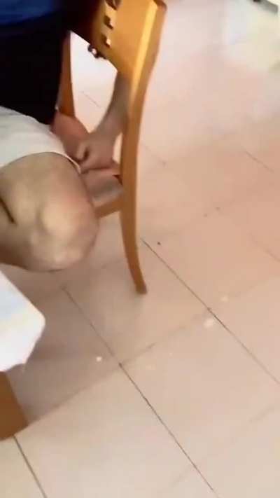 Pretending to feed the cat