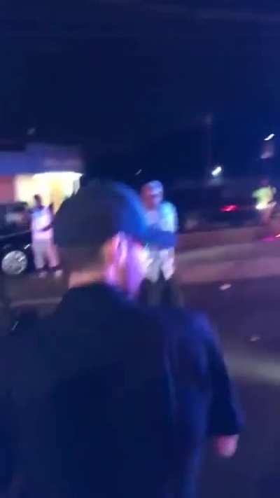 Police officers in Atlanta arrive to investigate a shooting but the crowd does not want any white officers involved in the investigation.