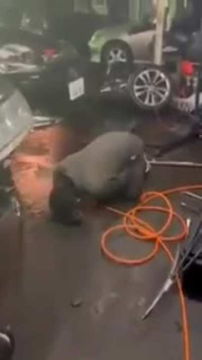 Unscrewing a shock absorber